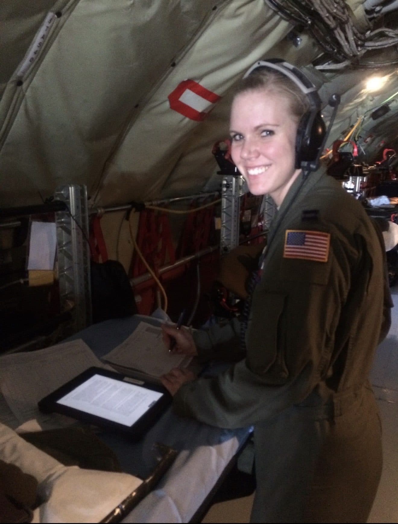 Jessica Frazier working aboard an aeromedical evacuation flight